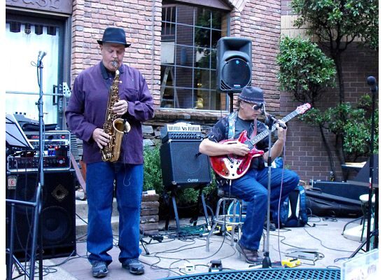 Sax and guitar courtyard